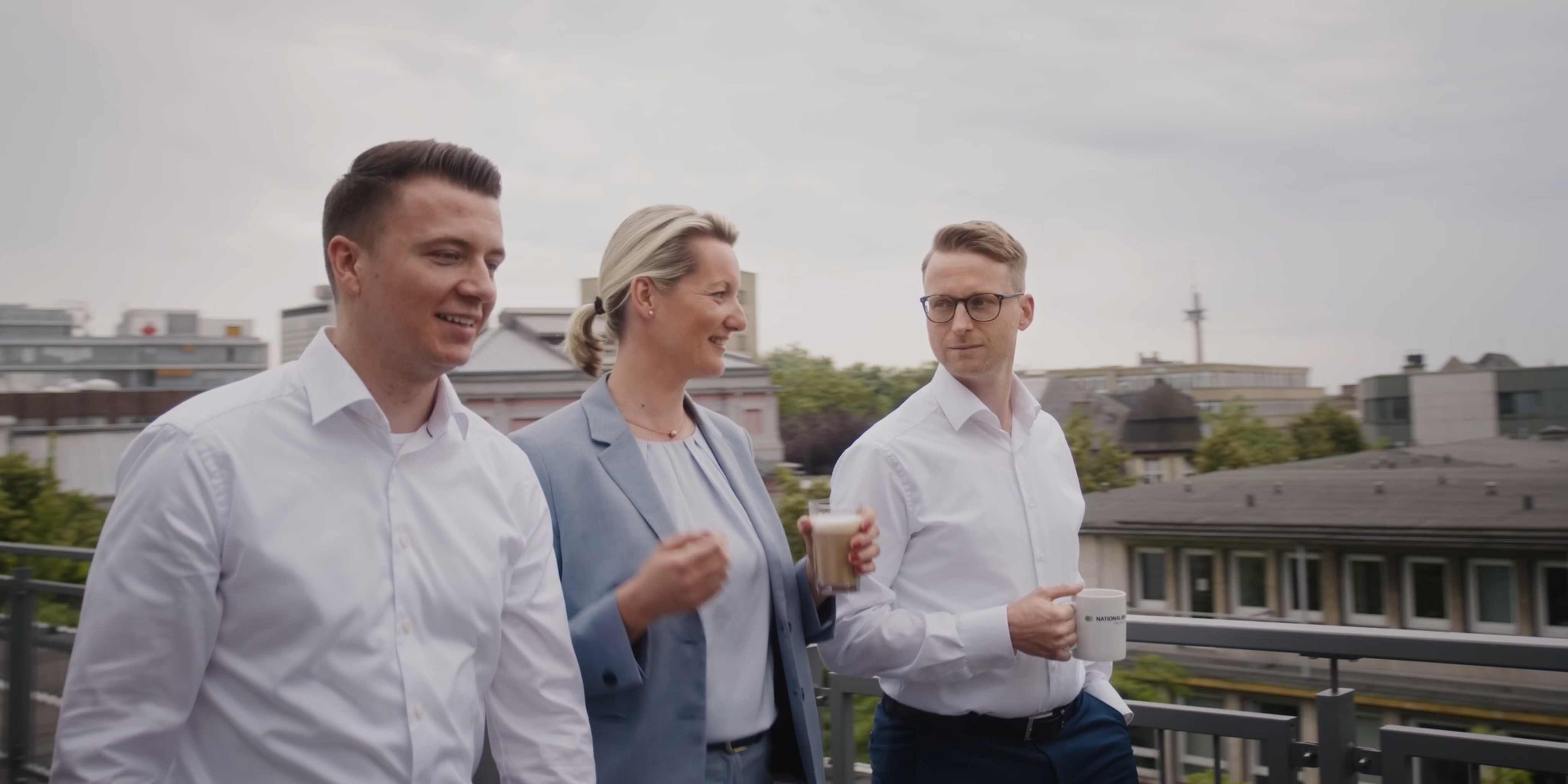 Bank colleagues talking on the terrace